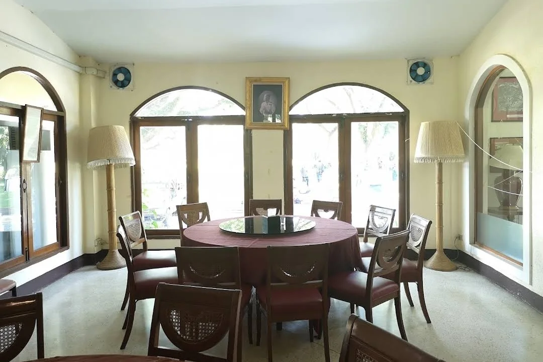 Colonial dining room with arches at Chiang Mai Gymkhana Club restaurant