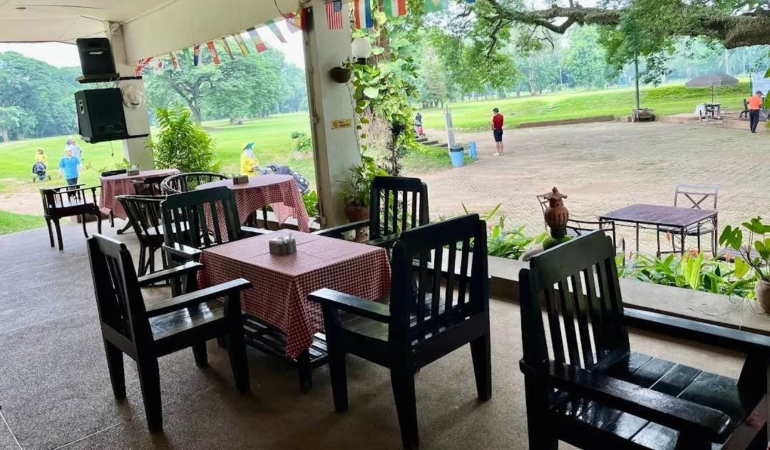 Restaurant terrace with golf course view at Chiang Mai Gymkhana Club
