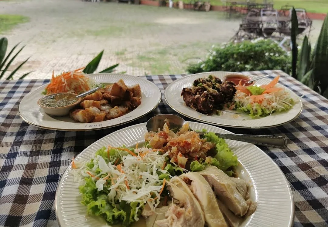 Three Thai dishes on the table at the Gymkhana restaurant